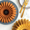 Moule à Bundt Brilliance Nordic Ware Tulband en or, ø 26 cm / 2,4 litres.